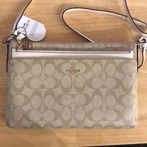 East/west crossbody with pop up pouch